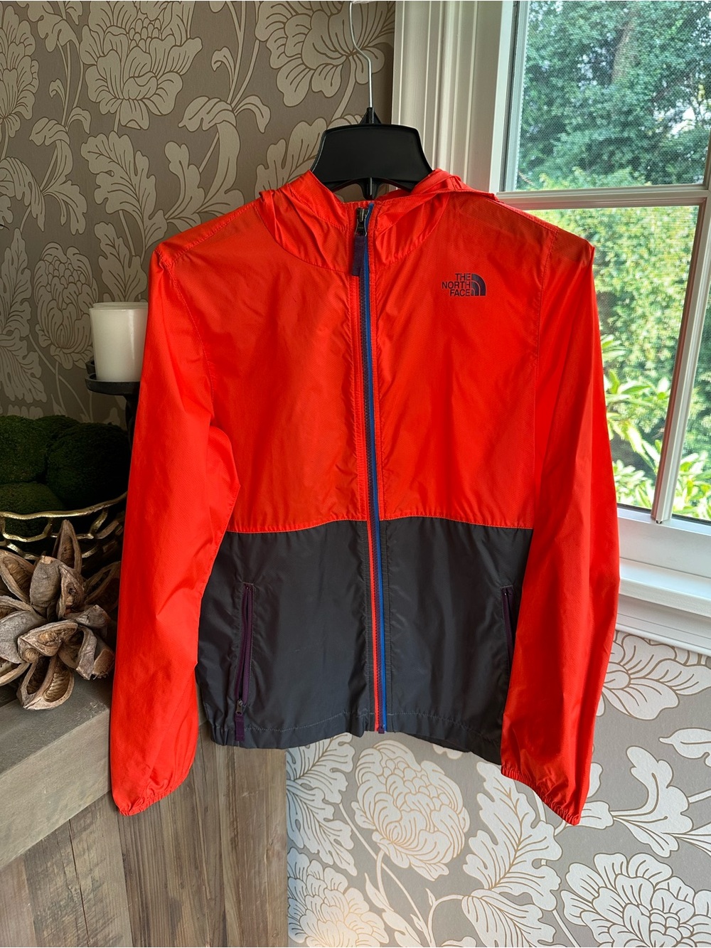 The North Face Kids Orange and Gray Raincoat